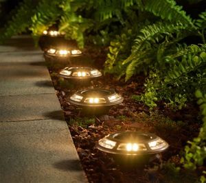 lot 1633 image: BrightEase Set of 10 Multiuse Solar Lights with Stakes, Black, Round-Retail - $50.92&nbsp