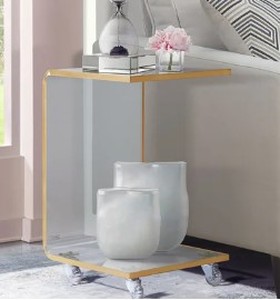 lot 2385 image: 24 High C Shaped Orange Acrylic End Table With Wheels
