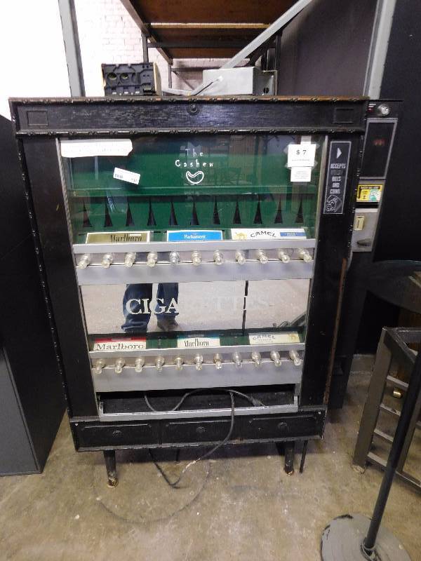 lot 137 image: National Vendors Cigarette Machine