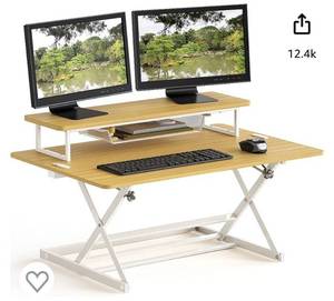 lot 21574 image: SHW 36-Inch Over Desk Height Adjustable Standing Desk with Monitor Riser, Oak (Retail $134.87)