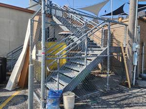 lot 29140 image: Metal Stair Case W Landing, Hand Rails, Fencing, and Gate
