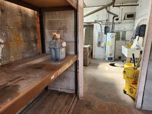 lot 29591 image: Contents of Room W Hotwater Heater, Kenmore Heater, Shop Sink And More