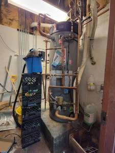 lot 18671 image: Rheem GHE100SU-200 100 Gallon Water Heater W Copper Piping