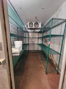 lot 18675 image: U-Shaped Green Metal Shelving