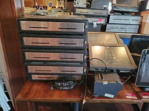 lot 18744 image: Contents of Table - Radiant System Monitor, NCR Monitor, Total of 5 Cash Drawers, and More