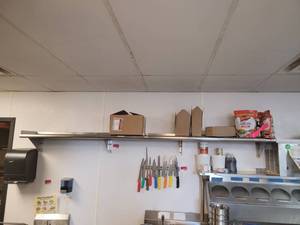 lot 18619 image: 9ft Stainless Steel Wall-Mount Shelf W Contents