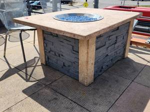lot 29076 image: Stone Fire Pit That Was Originally Propane Was Converted to Natural Gas