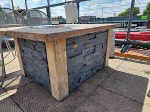 lot 29077 image: Stone Fire Pit That Was Originally Propane Was Converted to Natural Gas