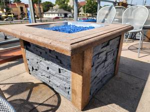 lot 29080 image: Stone Fire Pit That Was Originally Propane Was Converted to Natural Gas