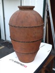 Very nice Decour vessel 45 inches tall made of wood but looks like metal very nice