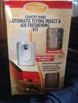 Automatic flying insect and air freshener in kit as picture