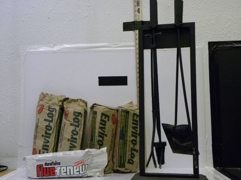 lot 7020 image: 5 Enviro-Logs & 5 Piece Metal Fireplace Set.