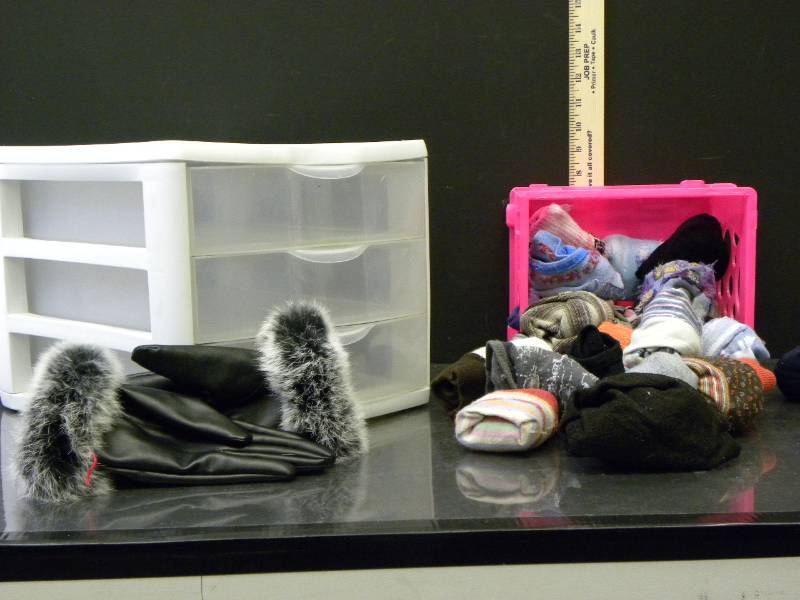 lot 7043 image: 3 Tier Plastic Container Bin. Imitation Fur Gloves. Pile of Quality Socks.