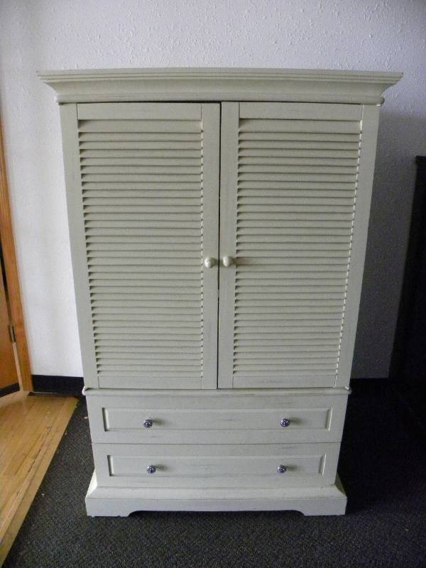 lot 7119 image: 58 T, 37 W, 25 D.  Distressed Look Linen Cabinet or Entertainment Center.