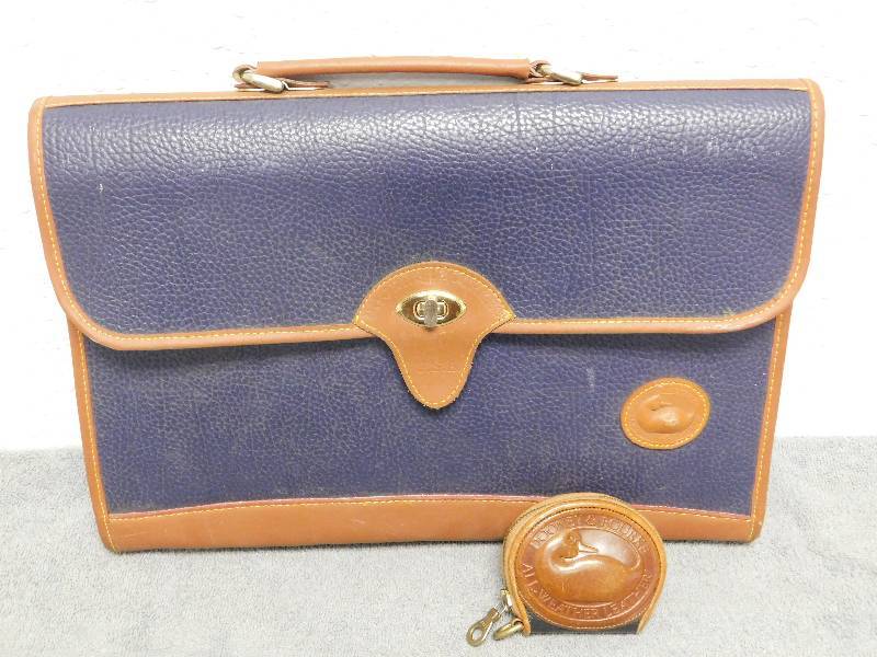 lot 7189 image: Dooney and Bourke Genuine All Weather Leather Briefcase & Matching Coin Purse.