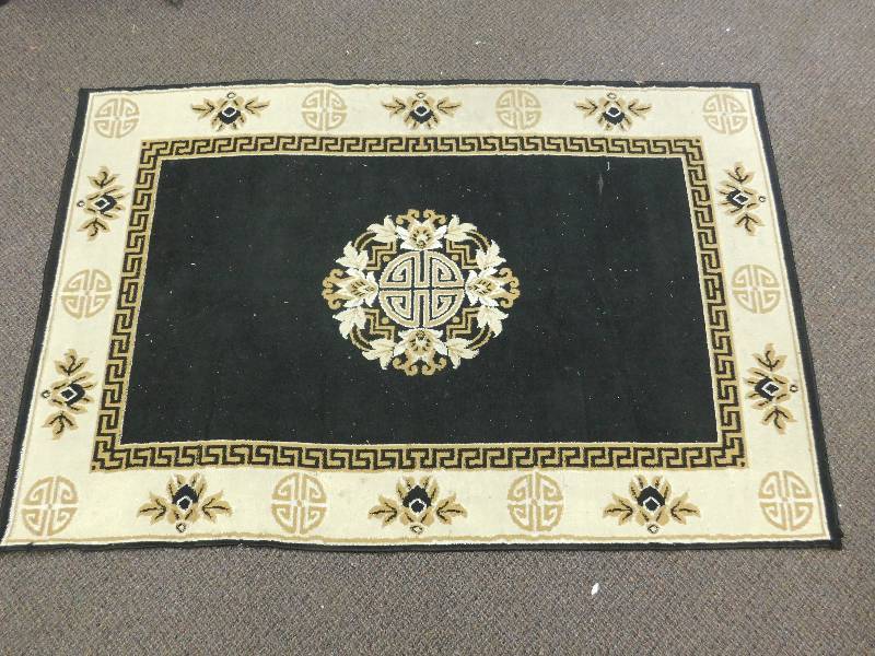 lot 7198 image: 4 11 x 7 5 Biege and Brown Area Rug.