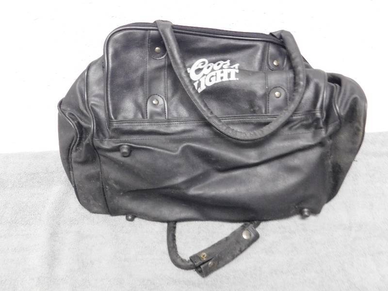 lot 7158 image: Distressed Coors Light Beer Leathered Bag.