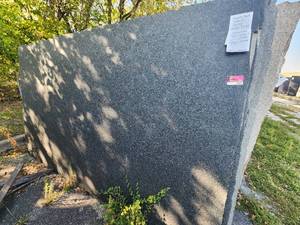 lot 7049 image: Lot of 9 Slabs Of Impala Black Granite, Honed