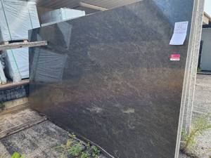 lot 9349 image: Lot of 7 Slabs of Verde Esmeralda Granite,Polished