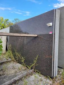 lot 9323 image: Lot of 7 Coffee Brown Polished Granite Slabs
