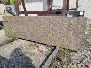 lot 9338 image: Lot of 5 Tropical Brown Polished Granite Prefab Countertops