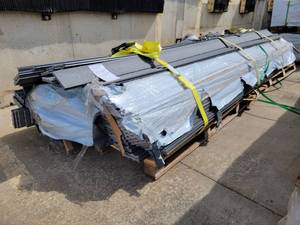 lot 9400 image: Crate of Grey Embossed Wood Composite Decking Boards, 140 Pieces