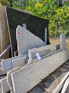 lot 7003 image: Assorted Lot of Remnants - Santa Ceceilia Granite, White Diamond Granite, Black Pearl Granite, and More
