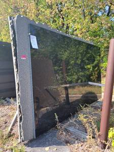 lot 7011 image: Lot of 5 Slab Remnants - Black Imperial and Black Pearl Granite