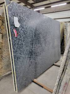 lot 3228 image: Lot of 2 Slabs of Soap Stone Green Granite, Leather