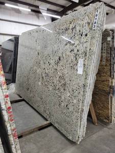 lot 3153 image: Lot of 3 Slabs of Ice Brown Granite Slabs, Polished