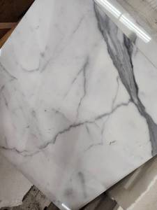 lot 5738 image: Crate of 12x12 Crema Europa Marble Tile