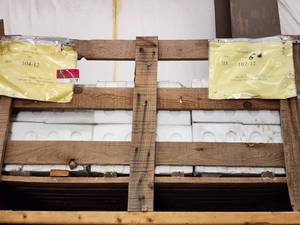 lot 5778 image: Crate of 12x12 Crema Marfil and Apollis Vein Marble Tile