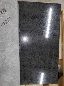 lot 5628 image: Crate of Black Absolute Black 18 X 18 Granite Tiles
