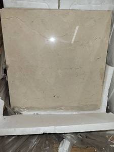lot 5633 image: Lot of Crema Marfil 18 X 18 Marble Tiles