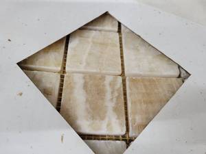 lot 5681 image: Crate of Gold Onyx Polished Granite 2 X 2 Tile Sheets