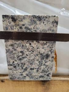 lot 5684 image: Crate of Deer Brown 12 X 12 Polished Granite Tiles