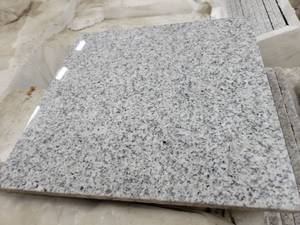 lot 5693 image: Crate of Pepperino 12 X 12 Polished Granite Tiles