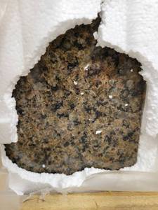 lot 5702 image: Crate of Tropical Brown Polished Granite 12 X 12 Tiles