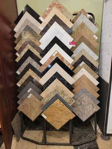 lot 22031 image: 3-Section Black Metal Display W Granite Square Samples