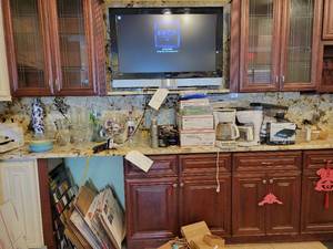 lot 22049 image: Contents of Counter - Coffee Mugs, Glassware, Coffee Makers, and More