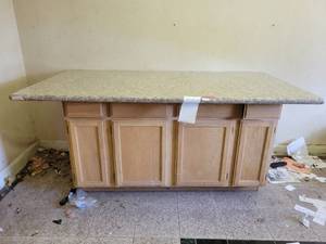 lot 22040 image: Light Wood Bottom Cabinetry W Almond Mauve Granite Top