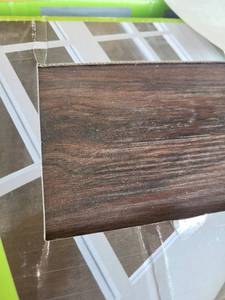 lot 9405 image: 28 Boxes of Stoneridged Flooring