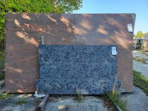 lot 7055 image: Lot of 2 Kinds of Granite Slabs - Remnants of Matric Granite Leather Finsh Slabs and Red Sahara Desert