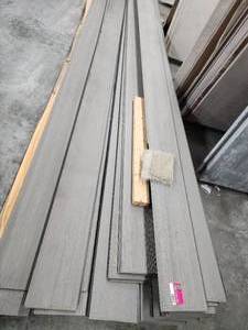 lot 18101 image: Pallet of Embossed Wood Composite Siding Boards