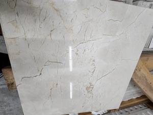 lot 5744 image: Crate of 12x12 Crema Marfil Marble Tile