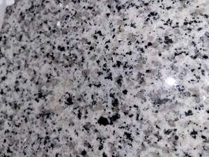 lot 5752 image: Crate of 12x12 Dalmation Granite Tile