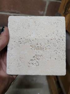 lot 5667 image: Crate of 4x4 Classic Light Tumbled Travertine Tile
