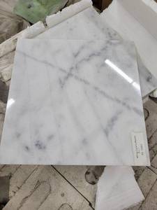 lot 5767 image: Crate of 12x12 White Carrara Marble Tile