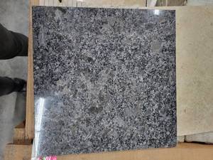 lot 5658 image: Crate of 12x12 Indian Silver Granite Tile