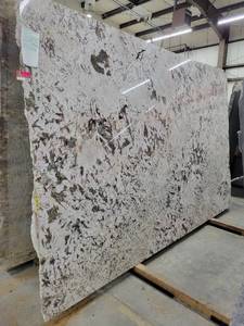 lot 3457 image: Lot of 2 Creme Nouveau Polished Granite Slabs